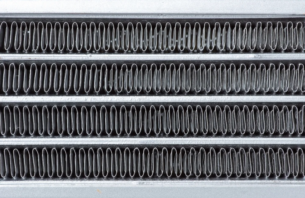 Oil Cooler คืออะไร? ทำหน้าที่อะไร และสำคัญกับเครื่องยนต์แค่ไหน
